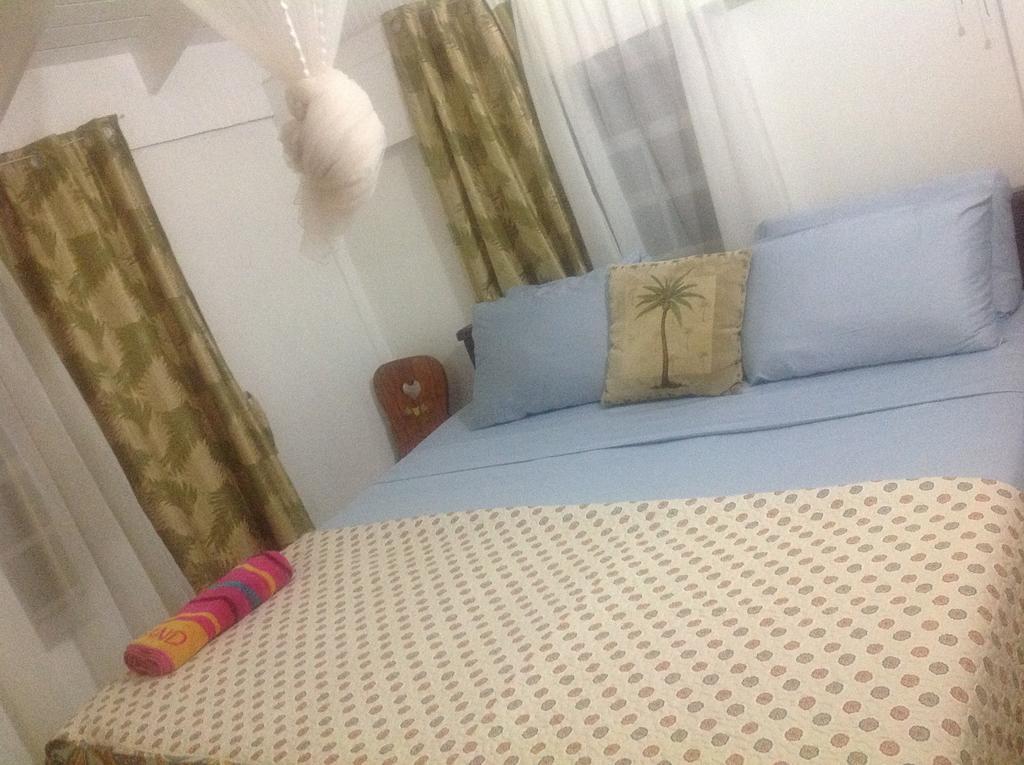 Rainbow Beach Apartments & Rooms Calibishie Phòng bức ảnh